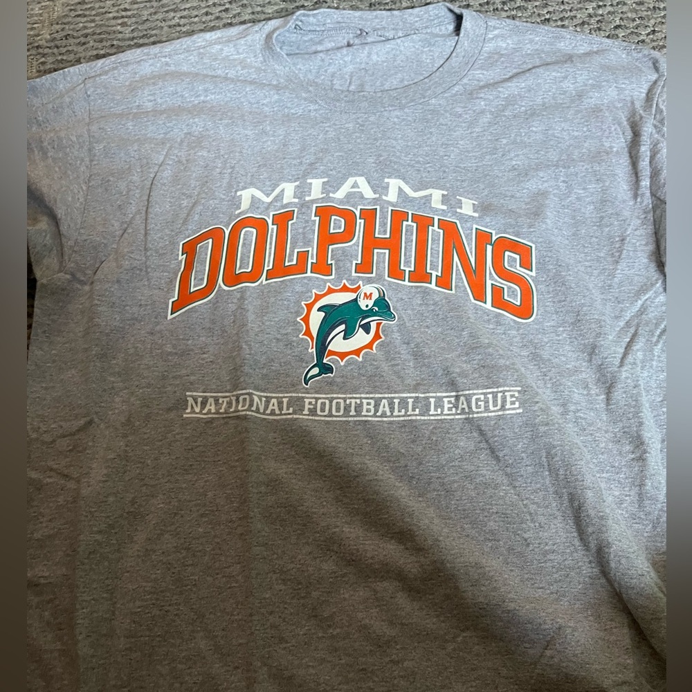 Miami dolphins most likely a size large used with no tag